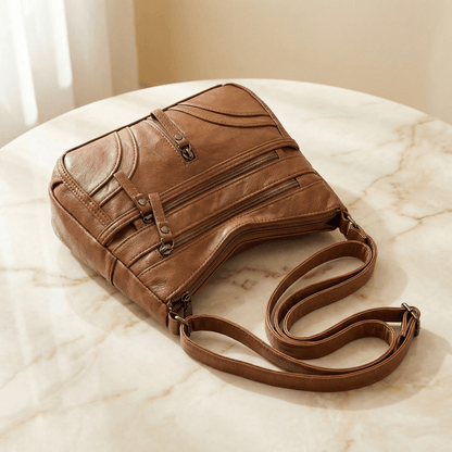 Caden Crossbody Bag | Soft PU Leather, 6 Zippered Pockets, Adjustable Strap - Hartwella