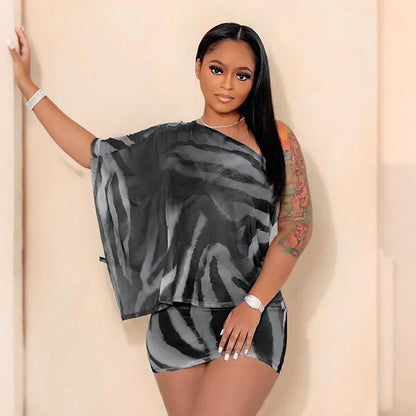 Ciera Skirt Set | Stretchy Animal Print, Draped Top and Mini Skirt - Hartwella